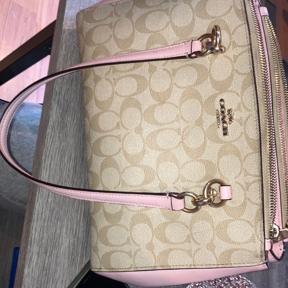 Light pink coach hang bag